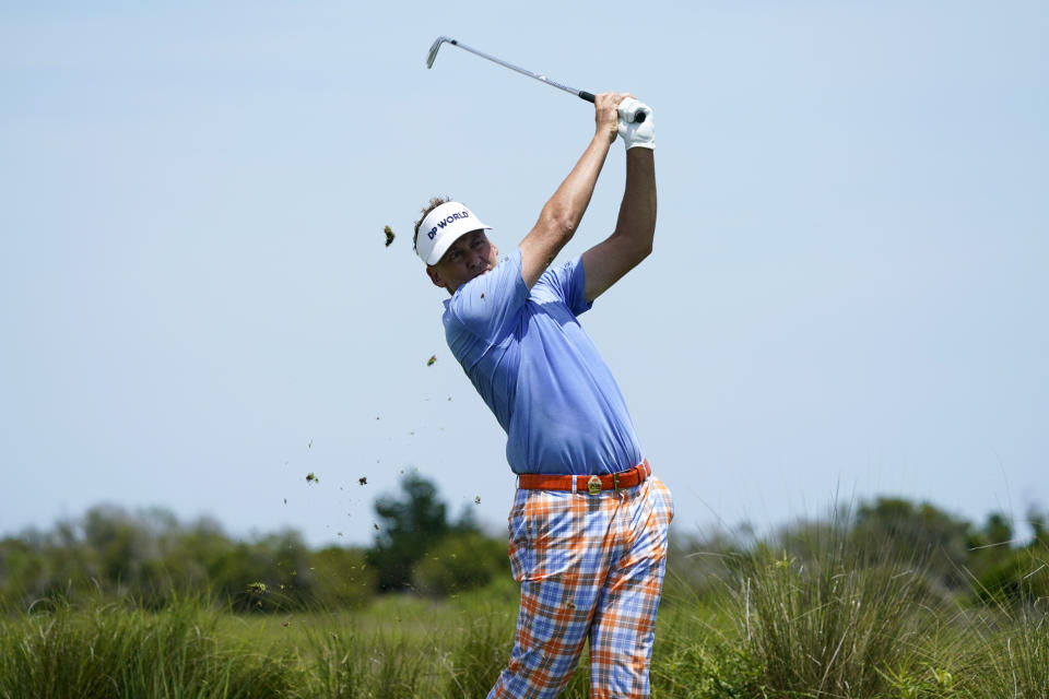 Ian Poulter, of England, hits off the fifth tee during the third round at the PGA Championship golf tournament on the Ocean Course, Saturday, May 22, 2021, in Kiawah Island, S.C. (AP Photo/Matt York)