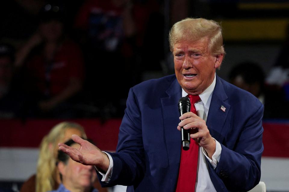 Republican presidential nominee and former U.S. President Donald Trump speaks during a campaign town hall meeting, moderated by Arkansas Governor Sarah Huckabee Sanders, in Flint, Michigan on September 17, 2024.