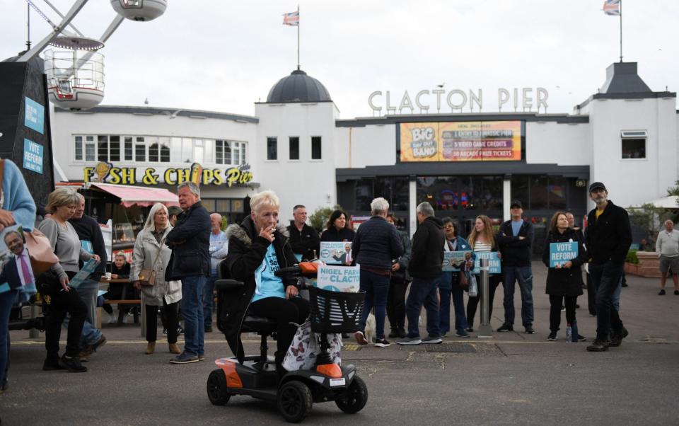 Reform supporters gathered at Clacton Pier to listen to Farage during a pre-election campaign visit