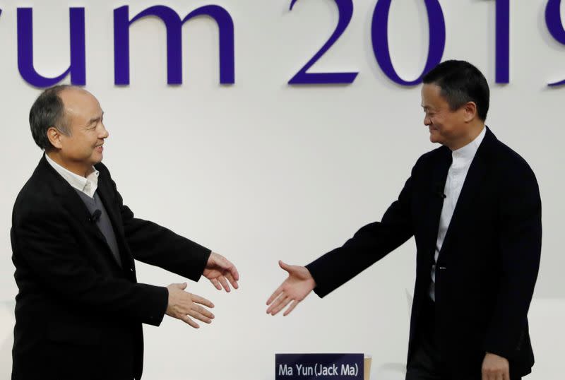 SoftBank Group founder and CEO Masayoshi Son and Alibaba founder and former Chairman Jack Ma attend the Tokyo Forum 2019 in Tokyo