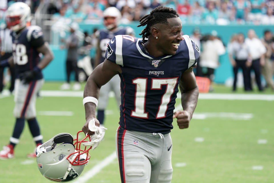 Sep 15, 2019; Miami Gardens, FL, USA; New England Patriots wide receiver Antonio Brown (17) celebrates in the fourth quarter against the Miami Dolphins at Hard Rock Stadium. The Patriots defeated the Dolphins 43-0.  Mandatory Credit: Kirby Lee-USA TODAY Sports