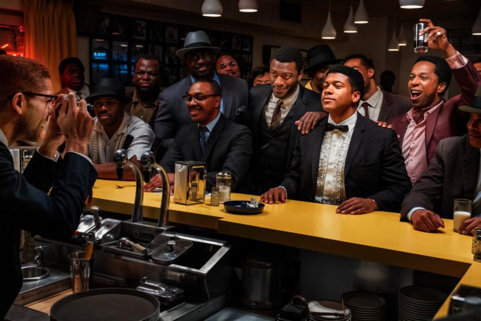 Aldis Hodge (third from right), Eli Goree (second from right) and Leslie Odom Jr. (far right) in "One Night in Miami."