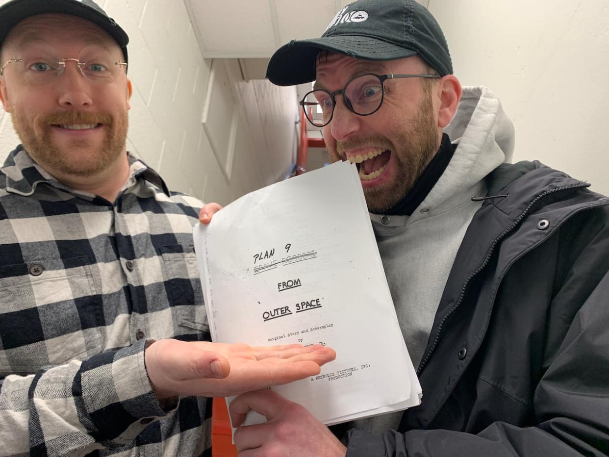 Mike Fardy, left, and Elling Lien are behind a new film challenge for movie buffs in Newfoundland and Labrador: to collaboratively remake the worst movie ever made. (Heather Barrett/CBC - image credit)