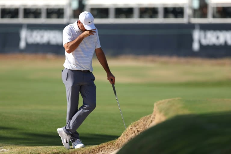 Scottie Scheffler reacts on the 15th green in Friday's second round at the US Open, where he fired a 74 without making a birdie for the first time in a major round (Gregory Shamus)