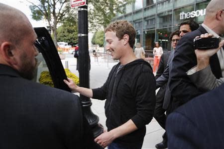 Facebook CEO Mark Zuckerberg departs after an onstage interview for the Atlantic Magazine in Washington, September 18, 2013. REUTERS/Jonathan Ernst