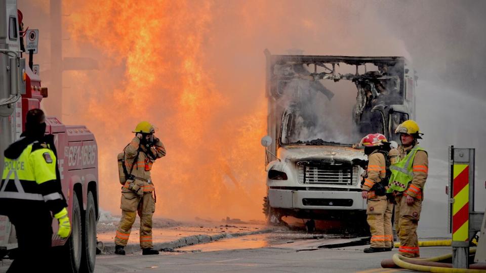 Flames consume a truck after a gas leak caught fire in Longueuil, Que., on Wednesday, Feb. 7, 2024.