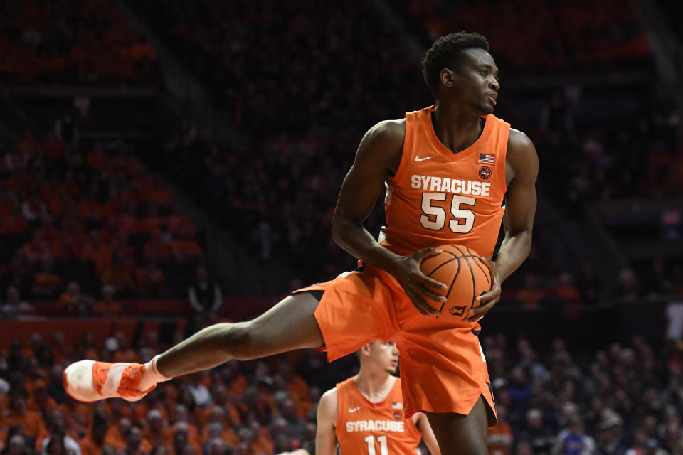 Syracuse's Mounir Hima grabs a rebound during the first half of the team's NCAA college basketball game against Illinois, Tuesday, Nov. 29, 2022, in Champaign, Ill. (AP Photo/Michael Allio)