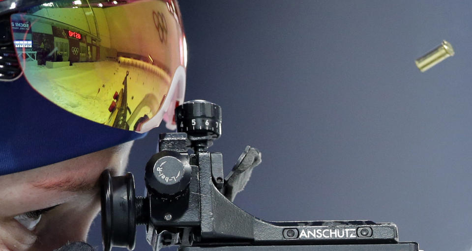 Norway's Tiril Eckhoff shoots during the mixed biathlon relay at the 2014 Winter Olympics, Wednesday, Feb. 19, 2014, in Krasnaya Polyana, Russia.