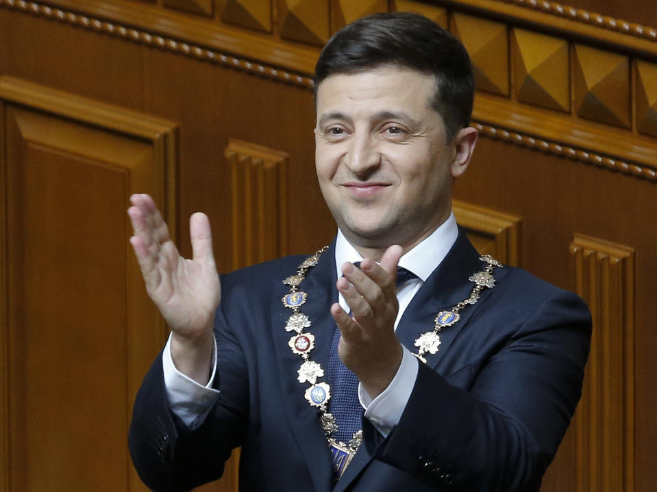 Ukrainian new President Volodymyr Zelenskiy gestures during his inauguration ceremony in Kiev, Ukraine, Monday, May 20, 2019. Television star Volodymyr Zelenskiy has been sworn in as Ukraine's next president after he beat the incumbent at the polls last month. The ceremony was held at Ukrainian parliament in Kiev on Monday morning. (AP Photo/Efrem Lukatsky)