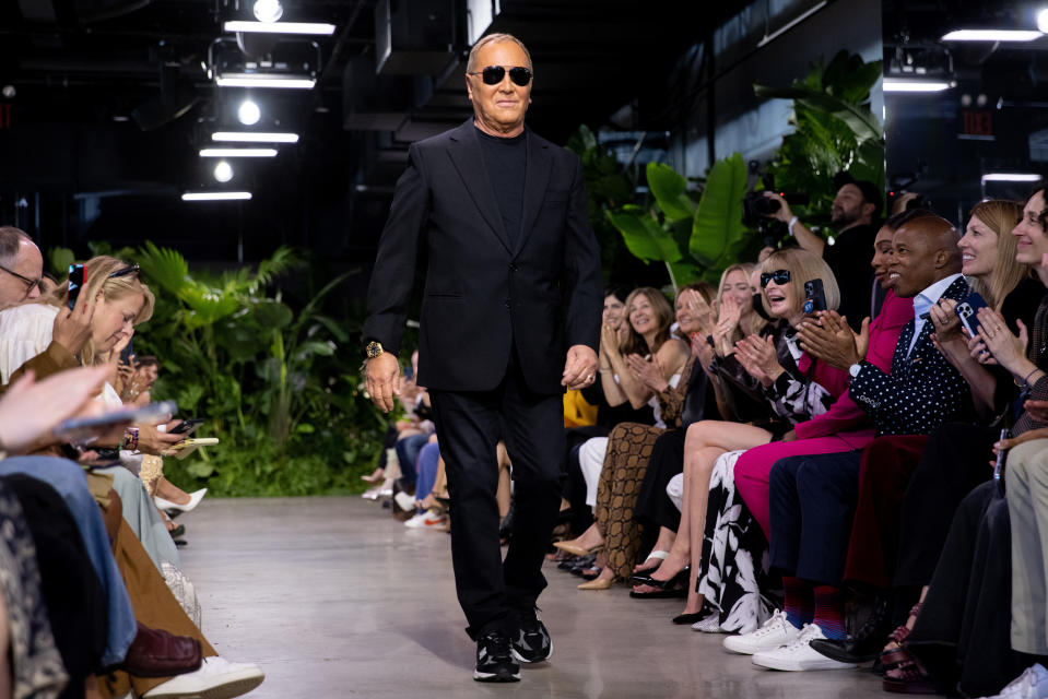 Michael Kors walks the runway at the conclusion of his fashion show during Fashion Week, Wednesday, Sept. 14, 2022, in New York. (AP Photo/Julia Nikhinson)