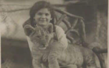 Judith Kerr as a child with a lion cub