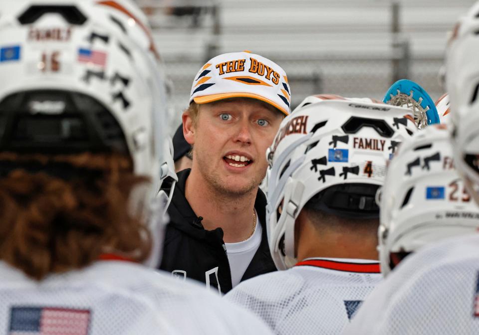 Tecumseh's head coach Bogar Trout talks to his team during a timeout in Wednesday's matchup against Chelsea.