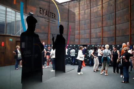 People visit an exhibition about demografic change called 'Ey Alter' by carmaker Mercedes Benz in Berlin, Germany June 5, 2018. Picture taken June 5, 2018. REUTERS/Axel Schmidt