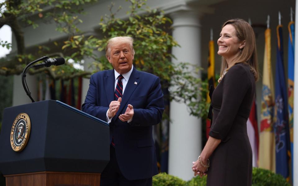 Donald Trump announces his US Supreme Court nominee, Judge Amy Coney Barrett, in the Rose Garden - OLIVIER DOULIERY/AFP via Getty Images