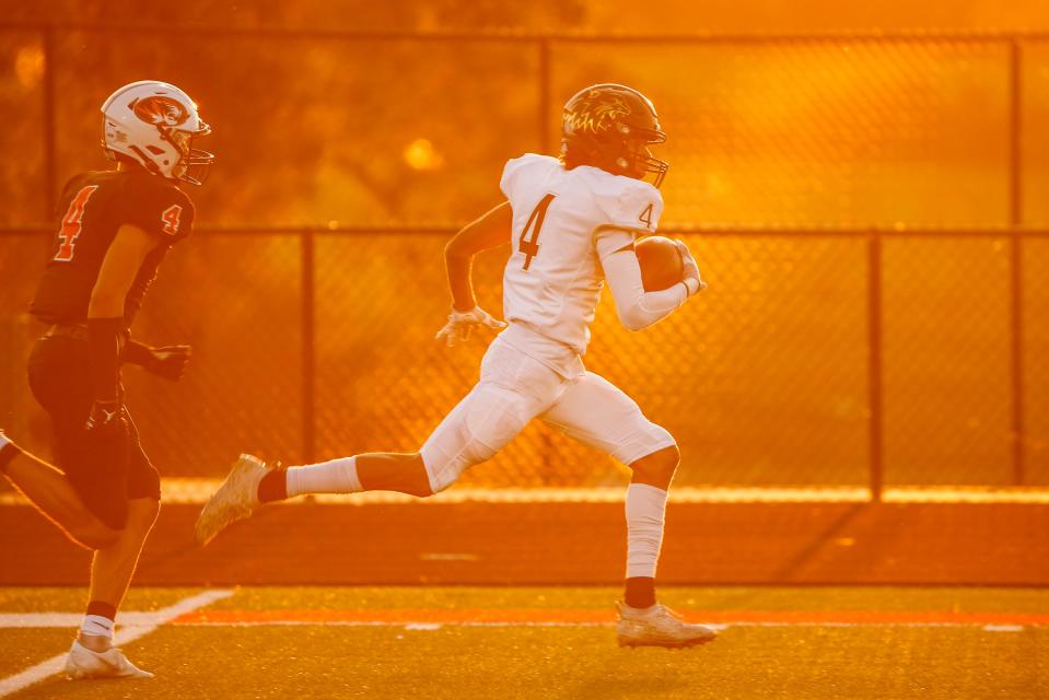 Neosho Wildcat Isaiah Green carries the ball for a touchdown as the Wildcats take on the Republic Tigers at Republic on Friday, Sept. 16, 2022. 