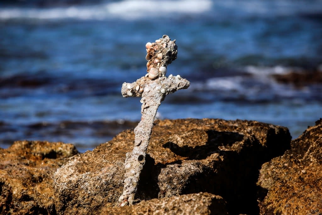 A sword believed to have belonged to a Crusader who sailed to the Holy Land almost a millennium ago was found in Caesarea (REUTERS)