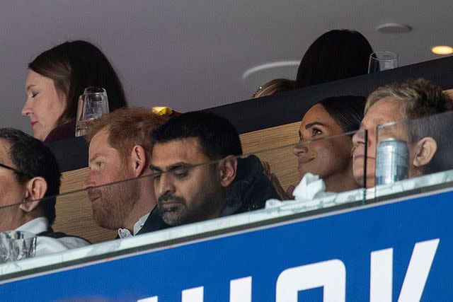 <p>Jeff Vinnick/NHLI via Getty</p> Meghan Markle and Prince Harry during the game on Monday