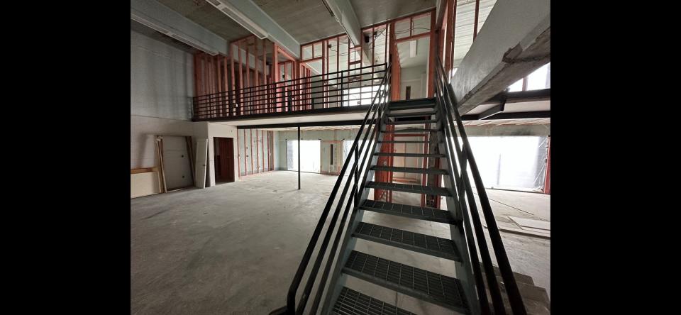 The interior of one of the apartment units being framed inside the former justice center. Plans call for the steel railing on staircases to changes to wood with wooden trim on then steps.