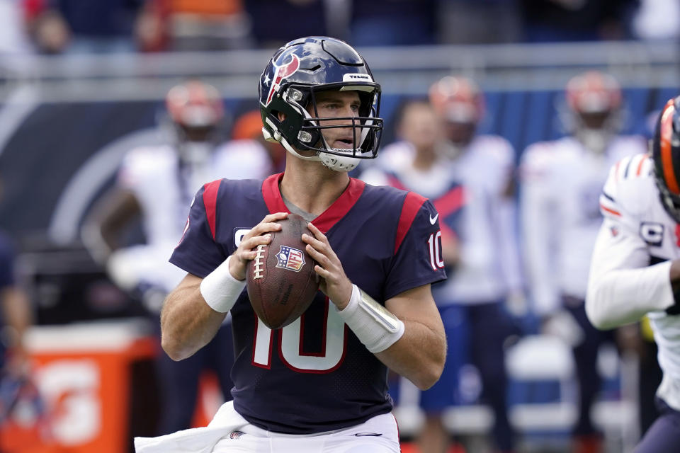 Houston Texans quarterback Davis Mills (10) looks to throw a pass against the Chicago Bears during the first half of an NFL football game Sunday, Sept. 25, 2022, in Chicago. (AP Photo/Charles Rex Arbogast)