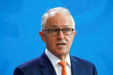 FILE PHOTO: Australia's Prime Minister Malcolm Turnbull and German Chancellor Angela Merkel (not pictured) address the media following their talks in Berlin, Germany, April 23, 2018. REUTERS/Fabrizio Bensch/File Photo