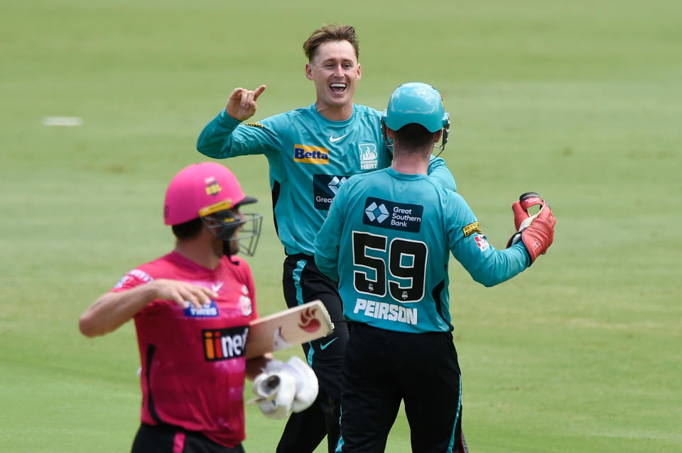 BRISBANE, AUSTRALIA - JANUARY 19: Marnus Labuschagne of the Heat celebrates the wicket of Moises Henriques of the Sixers during the Men's Big Bash League match between the Brisbane Heat and the Sydney Sixers at The Gabba, on January 19, 2022, in Brisbane, Australia. (Photo by Matt Roberts/Getty Images)