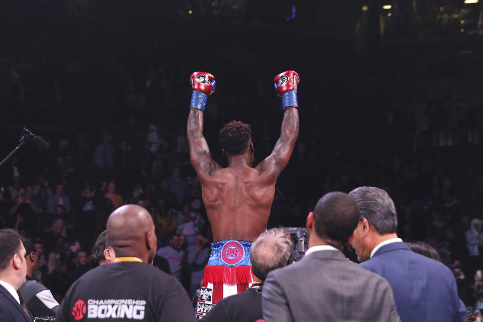Jermall Charlo celebrates after defeating Ireland's Dennis Hogan during the seventh round of a WBC middleweight title boxing match Saturday, Dec. 7, 2019, in New York. (AP Photo/Michael Owens)