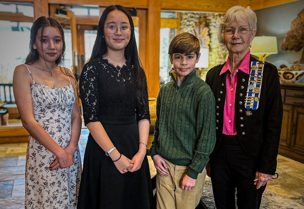 The Joseph McDowell Chapter Daughters of the American Revolution American History essay award winners were announced on Jan. 13 at Champion Hills Club. From left to right are Aislean Esquivel (eight grade) Classical Scholars, Alivia Chen (seventh grade) Hendersonville Middle School, Scotty Keplinger (fifth grade) Bruce Drysdale Elementary School and Laura Lee Jordan, Joseph McDowell Chapter American History Essay Chair.