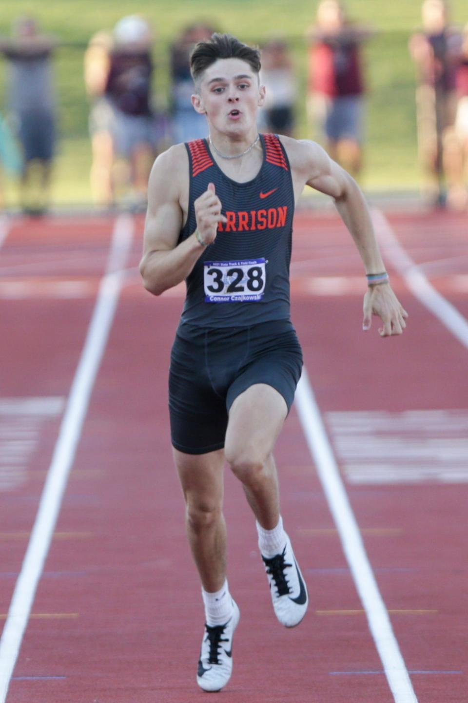 Harrison's Connor Czajkowski competes in the 200 meter dash during the IHSAA Boys State Track Finals, Friday, June 4, 2021 in Indianapolis. Czajkowski placed first in the 200 meter dash with a time of 21.55.