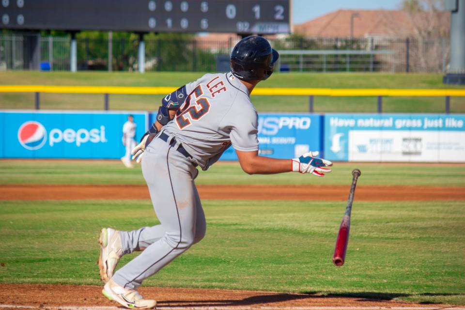 Detroit Tigers infielder Hao-Yu Lee runs out of the batter's box after hitting the ball for the Salt River Rafters in the Arizona Fall League on November 1, 2023 in Peoria, Arizona.
