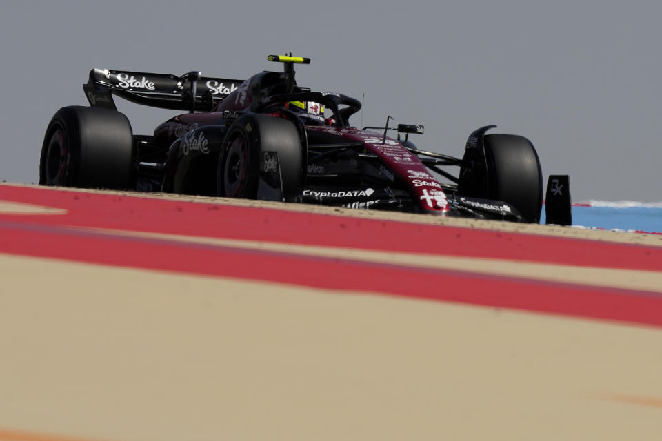 Alfa Romeo driver Guanyu Zhou of China steers his car during a Formula One pre season test at the Bahrain International Circuit in Sakhir, Bahrain, Friday, Feb. 24, 2023.(AP Photo/Frank Augstein)