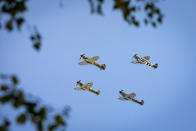 A flypast to mark the 80th anniversary of the Battle of Britain flies over Westminster Abbey, London.