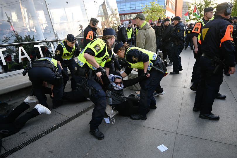 Swedish police forces remove pro-Palestinian demonstrators protesting against Israel's participation -Credit:Getty Images