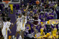 Texas A&M guard Quenton Jackson (3) shoots over LSU forward Tari Eason (13) during the second half an NCAA college basketball game against Texas A&M in Baton Rouge, La., Wednesday, Jan. 26, 2022. (AP Photo/Matthew Hinton)