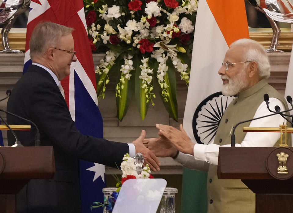 Indian Prime Minister Narendra Modi shakes hand with his Australian counterpart Anthony Albanese after exchange of agreements and press statement, in New Delhi, India, Friday, March 10, 2023. (AP Photo/Manish Swarup)