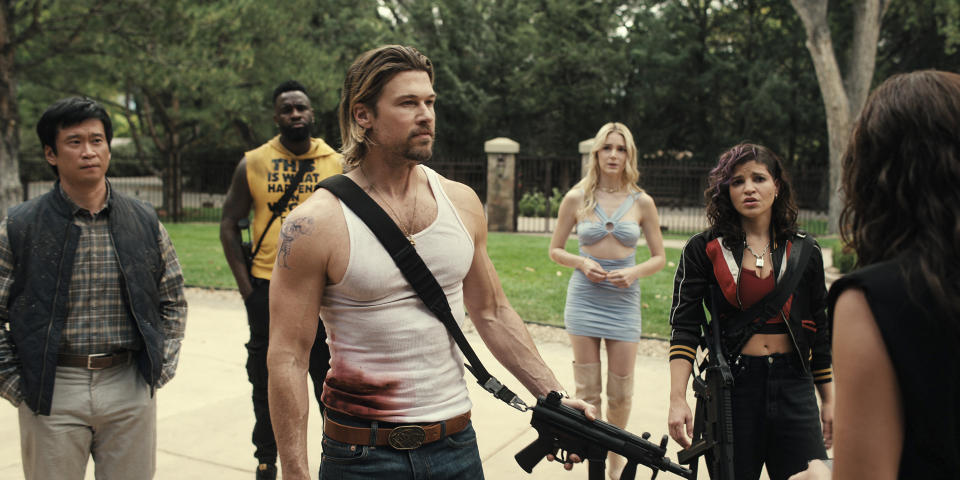 This image released by Netflix shows cast members, from left, Eugene Kim, Terrence Terrell, Nick Zano, Alyson Gorske, and Paola Lázaro in a scene from the series "Obliterated." (Netflix via AP)