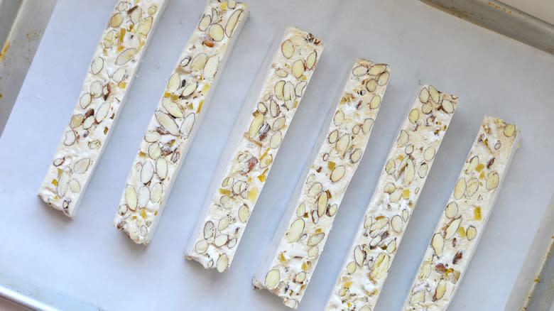 nougat slices on lined baking tin