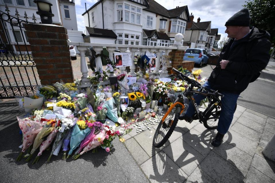 Flowers are left after the vigil (Beresford Hodge/PA) (PA Wire)