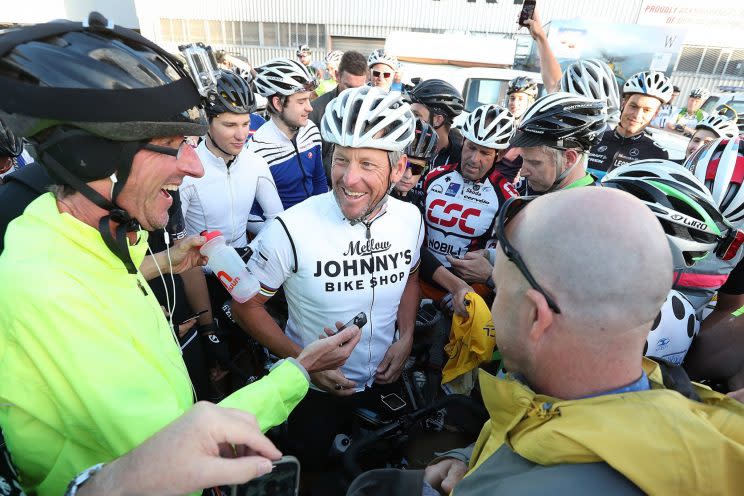 Armstrong chats with fellow cyclists in Auckland, New Zealand, late last year. (Fiona Goodall/Getty Images)