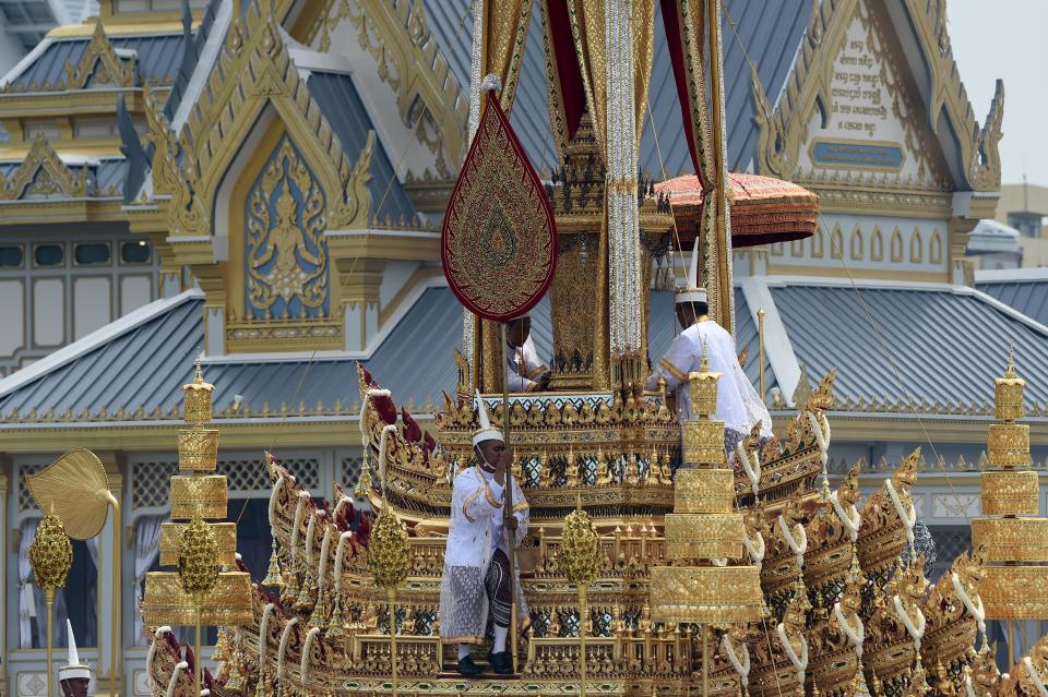 Thai royal doctors take part in the funeral procession for the late Thai king Bhumibol Adulyadej in Bangkok on Oct. 26, 2017.