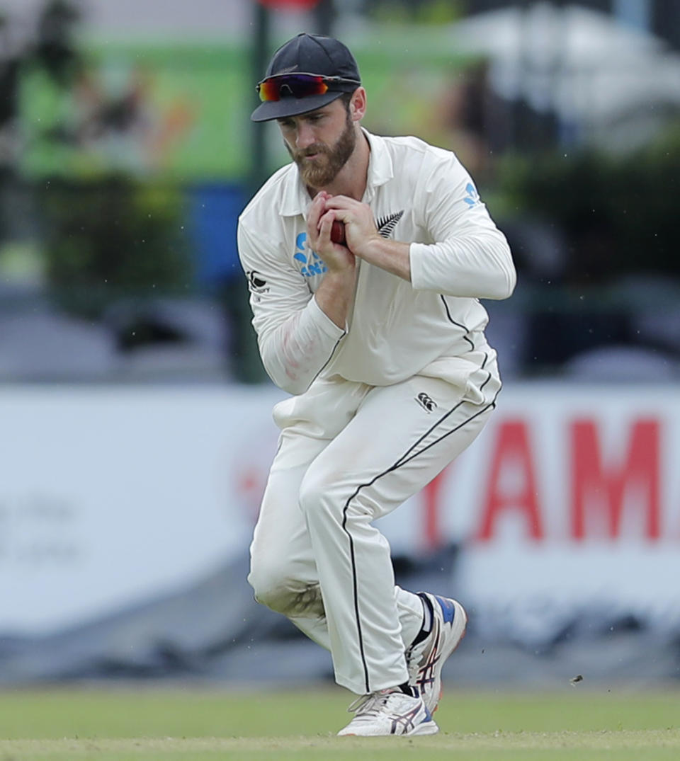 New Zealand's Kane Williamson takes a catch to dismiss Sri Lanka's Lahiru Thirimanne during the first day of the second test cricket match between Sri Lanka and New Zealand in Colombo, Sri Lanka, Thursday, Aug. 22, 2019. (AP Photo/Eranga Jayawardena)