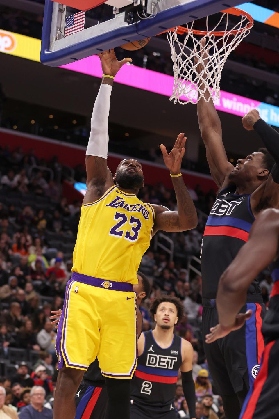 Lakers forward LeBron James gets a shot off past Pistons center Jalen Duren in the first half on Wednesday, Nov. 29, 2023, at Little Caesars Arena.