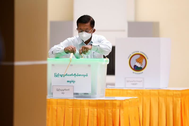 Myanmar's Army Chief Min Aung Hlaing cast his ballot during the general election at a polling station in Naypyitaw, Myanmar