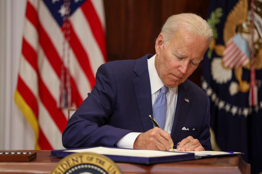 President Joe Biden signs the Bipartisan Safer Communities Act into law in the Roosevelt Room of the White House on June 25, 2022. (Photo by Tasos Katopodis/Getty Images)
