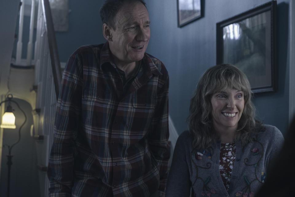 This image released by Netflix shows Toni Collette, right, and David Thewlis in a scene from "I'm Thinking of Ending Things." (Mary Cybulski/Netflix via AP)