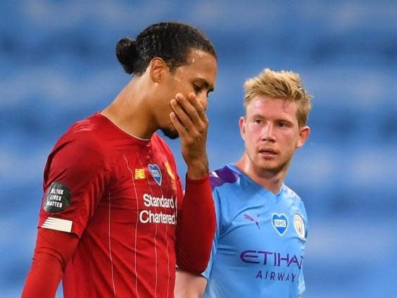 Virgil van Dijk reacts during the defeat (Reuters)