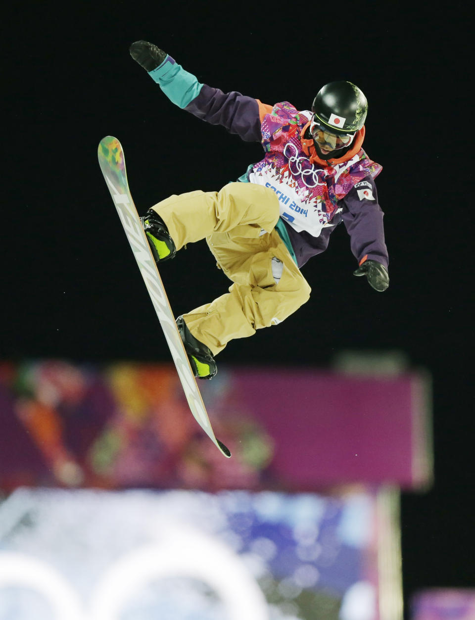 Japan's Ayumu Nedefuji gets air during a snowboard half pipe training session at the Rosa Khutor Extreme Park at the 2014 Winter Olympics, Monday, Feb. 10, 2014, in Krasnaya Polyana, Russia. (AP Photo/Andy Wong)