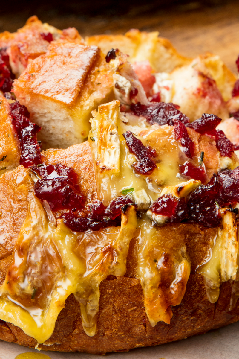 <p>Pull-apart bread reaches a whole new level...</p><p>Get the <a href="https://www.delish.com/uk/cooking/recipes/a29707806/cranberry-brie-pull-apart-bread-recipe/" rel="nofollow noopener" target="_blank" data-ylk="slk:Cranberry Brie Pull-Apart Bread;elm:context_link;itc:0;sec:content-canvas" class="link ">Cranberry Brie Pull-Apart Bread</a> recipe.</p>