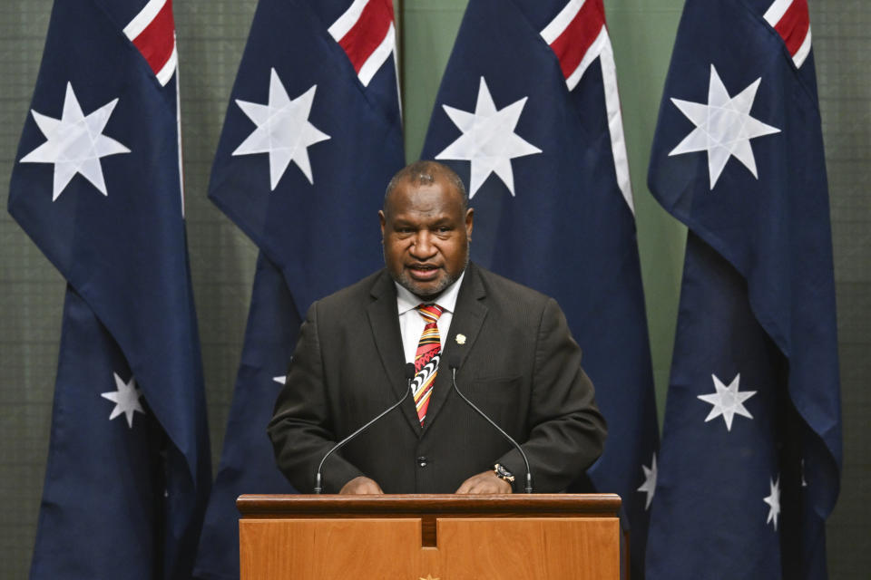 Papua New Guinea's Prime Minister James Marape addresses members and senators in the House of Representatives at Parliament House in Canberra, Australia, Thursday, Feb. 8, 2024. (Mick Tsikas/AAP Image via AP)