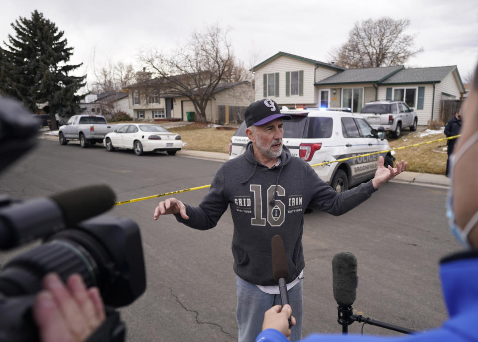 Kirby Klements talks about a piece of debris that crushed his pickup truck parked next to his home in Broomfield, Colo., as the plane shed parts while making an emergency landing at nearby Denver International Airport Saturday, Feb. 20, 2021. (AP Photo/David Zalubowski)