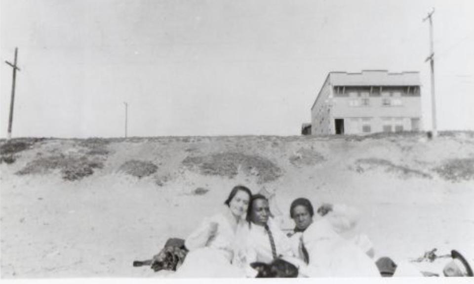 Black and white photo shows residents at Bruce's Beach.